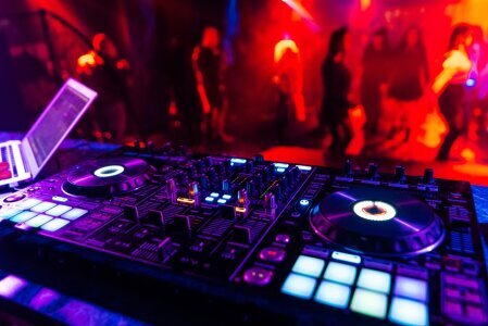 professional_dj_mixer_controller_mixing_music_nightclub